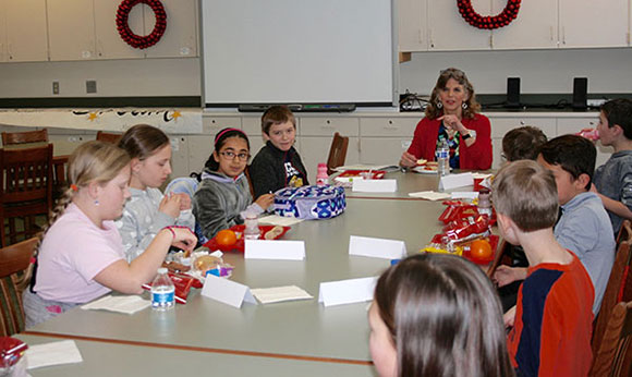 Jen Bryant sharing lunch with students